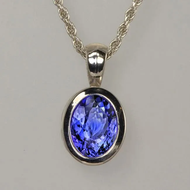White Gold 14K Oval Cut Blue Tanzanite 14 Ct Pendant With Chain GB Necklaces White Gold 14K Oval Cut Blue Tanzanite 14 Ct Pendant With Chain GB Necklaces