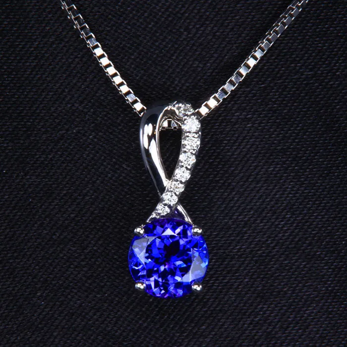 14K White Gold Round Tanzanite and Diamond Pendant 101 Carats Moriartys Gem Art Necklaces 14K White Gold Round Tanzanite and Diamond Pendant 101 Carats Moriartys Gem Art Necklaces