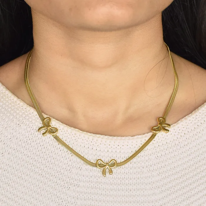 Gold Bow Necklace Upakarna Necklaces