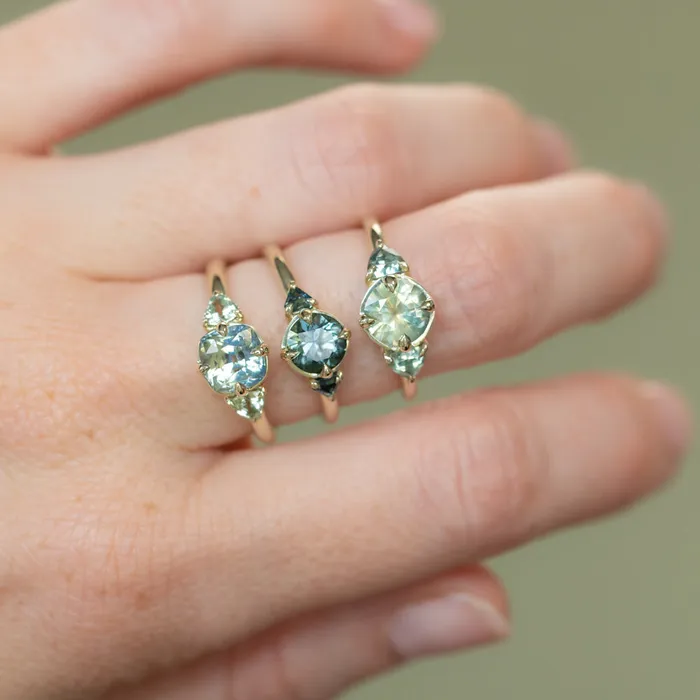 Rings Anueva Jewelry 128ct Round Parti Teal Green Untreated Montana Sapphire and Trillion Parti Sapphire Low Profile Ring in 14k Green Gold